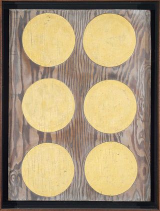 Framed wooden art work with six light circles inside