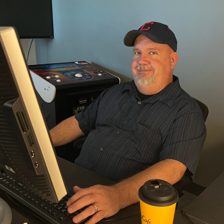 Jim Zielinski at his desk, from the Incredible Technologies blog
