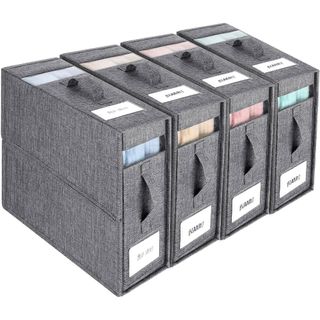 set of four grey storage boxes with labels