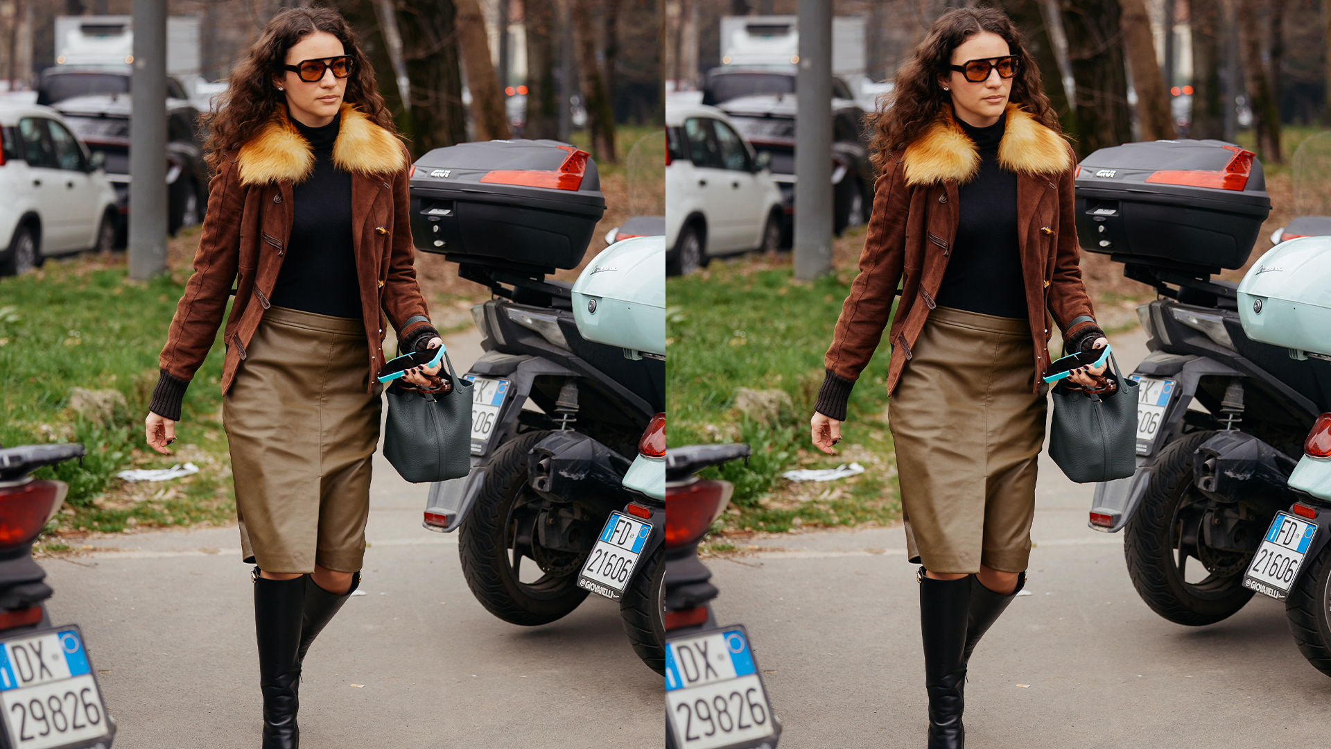 Model wears black turtleneck, leather jacket with fur trim, a pencil skirt, and tall boots. 