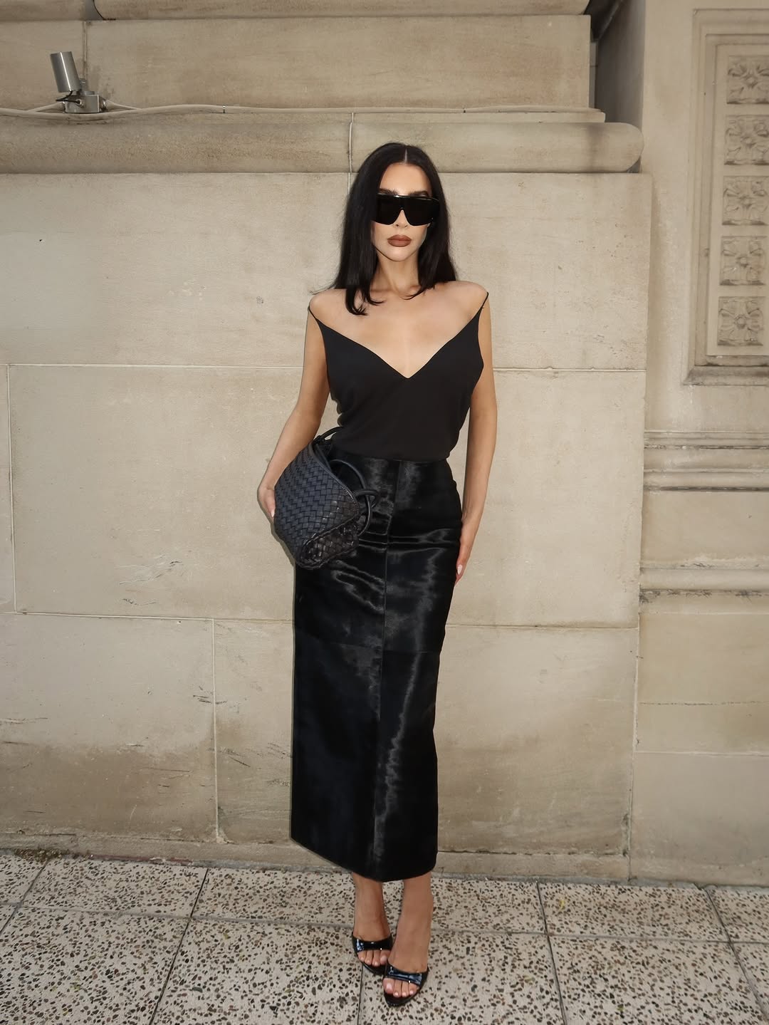 woman wearing black patent leather heels trend