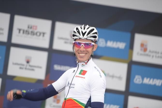 Out going world champion Rui Costa smiles before he start