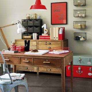 home office with trunk sideboard and chair
