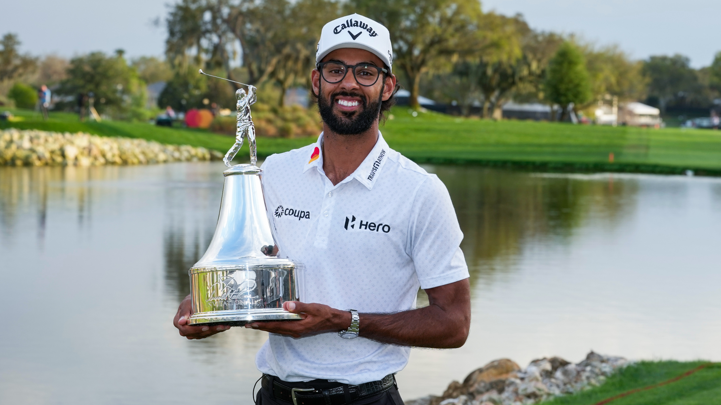 Akshay Bhatia with the Arnold Palmer Invitational trophy