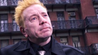 John Lydon in front of The Chelsea Hotel New York