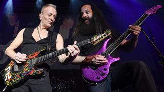 Guitarists Phil Collen (L) and John Petrucci perform as part of the G3 concert tour at Brooklyn Bowl Las Vegas at The Linq Promenade on January 17, 2018 in Las Vegas, Nevada.