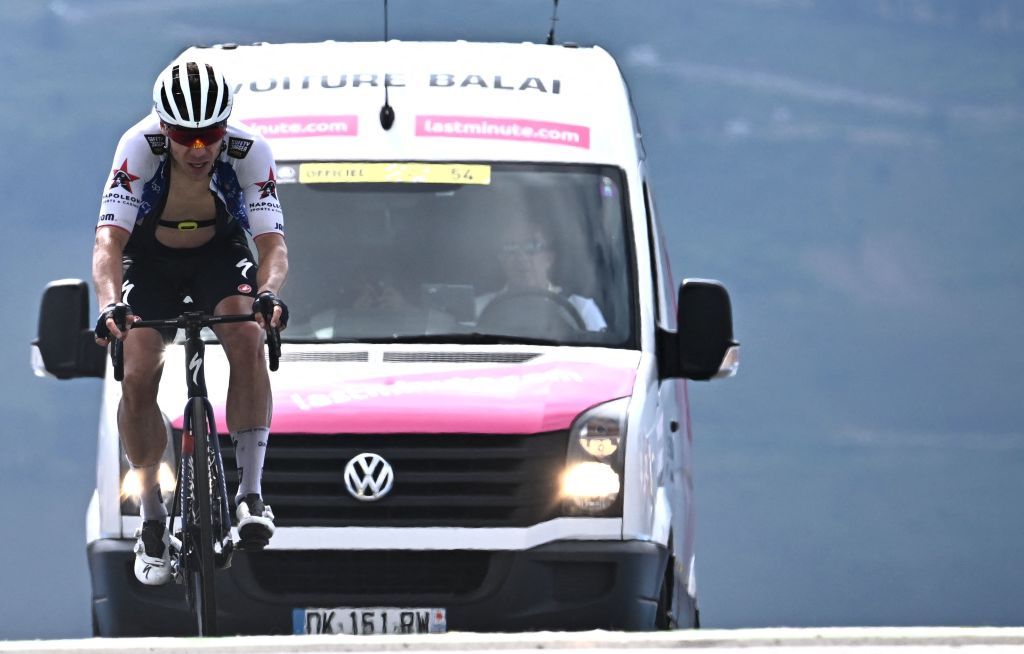 QuickStep Alpha Vinyl Teams Dutch rider Fabio Jakobsen cycles to the finish line ahead of the closing vehicle Voiture Balai during the 17th stage of the 109th edition of the Tour de France cycling race 1297 km between SaintGaudens and Peyragudes in southwestern France on July 20 2022 Photo by AnneChristine POUJOULAT AFP Photo by ANNECHRISTINE POUJOULATAFP via Getty Images
