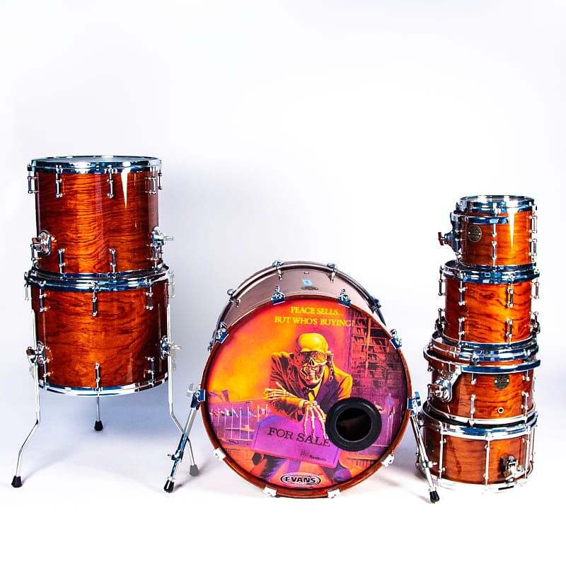 A seven-piece DDrum drum kit with featuring Peace Sells... cover art on the kick