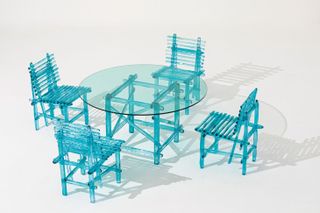 Chairs and dining table from the ‘A’mare’ collection