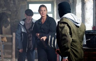 Moira confronts the intruders