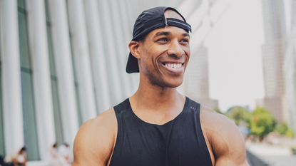 man standing and smiling