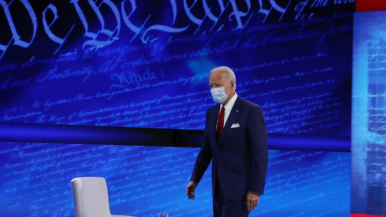 Democratic candidate Joe Biden wearing a face mask during a town hall event