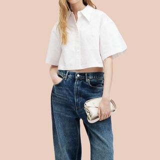 flat lay image of woman in white shirt and denim jeans 