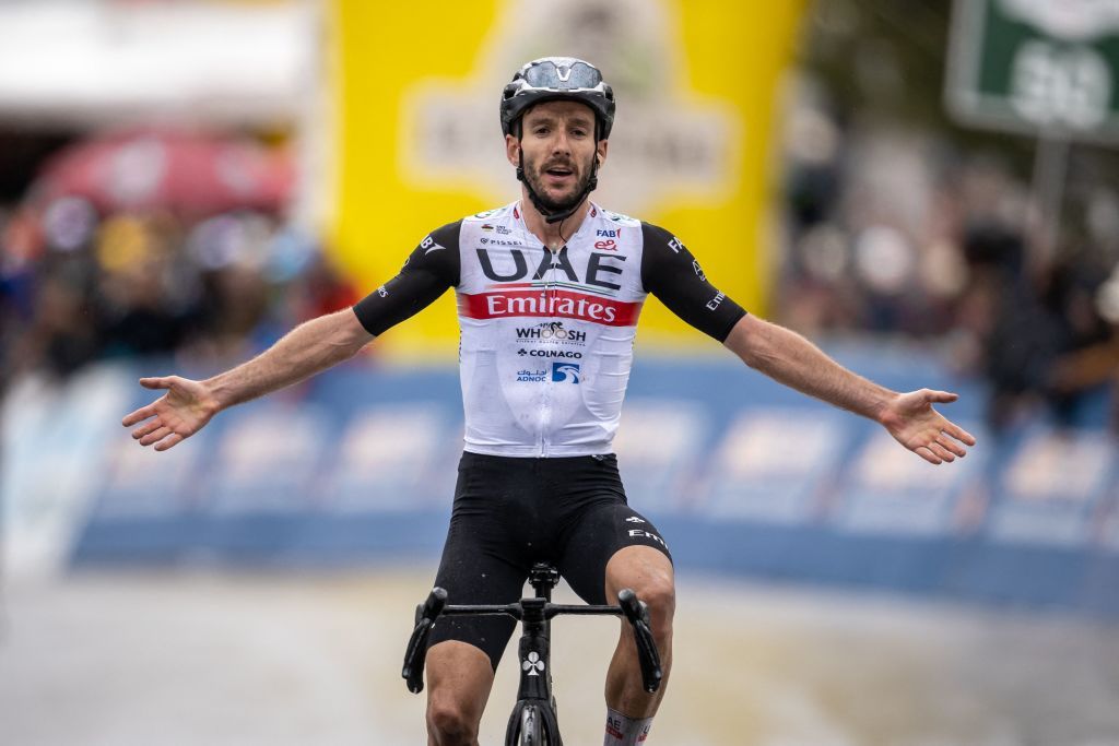 Britains Adam Yates celebrates after winning the fourth stage of the Tour de Romandie UCI cycling World tour 1616 km from Sion to Thyon on April 29 2023 Photo by Fabrice COFFRINI AFP Photo by FABRICE COFFRINIAFP via Getty Images