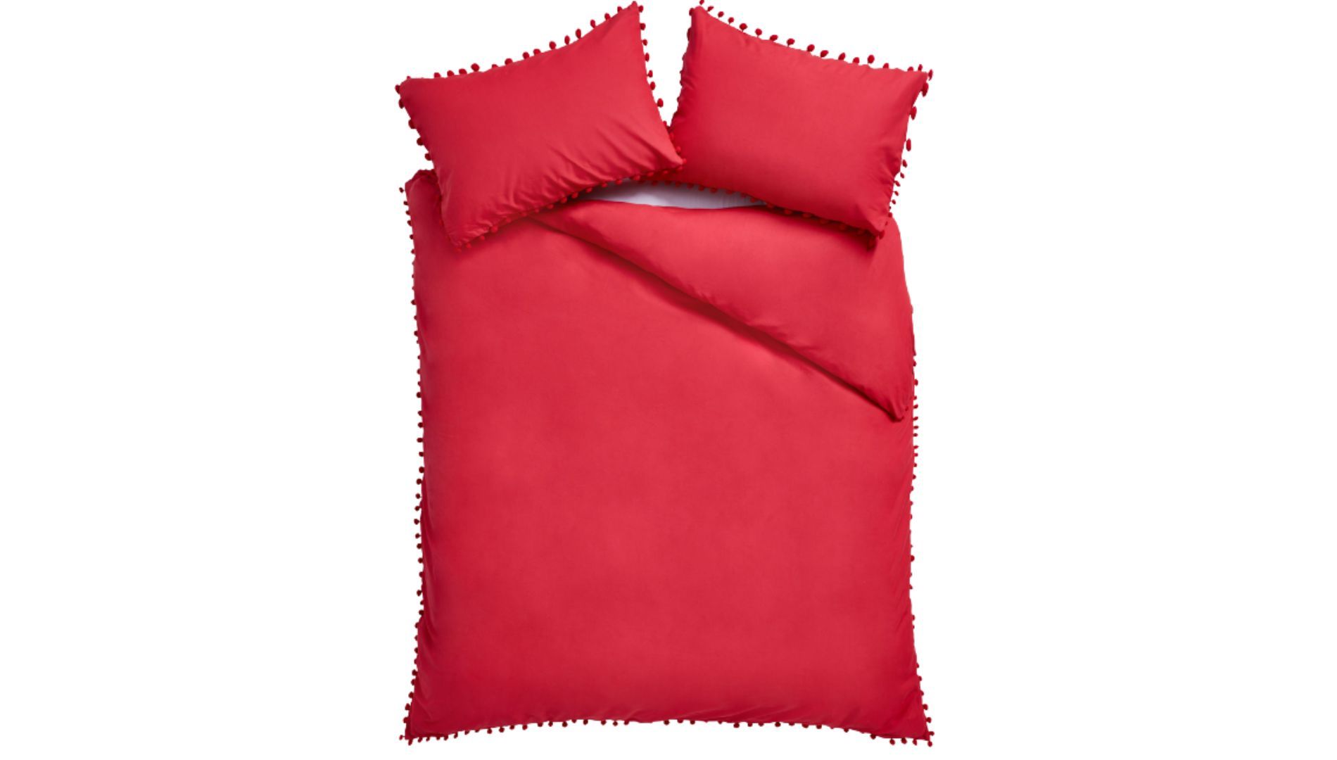 A red bedding set with a pom-pom trim.