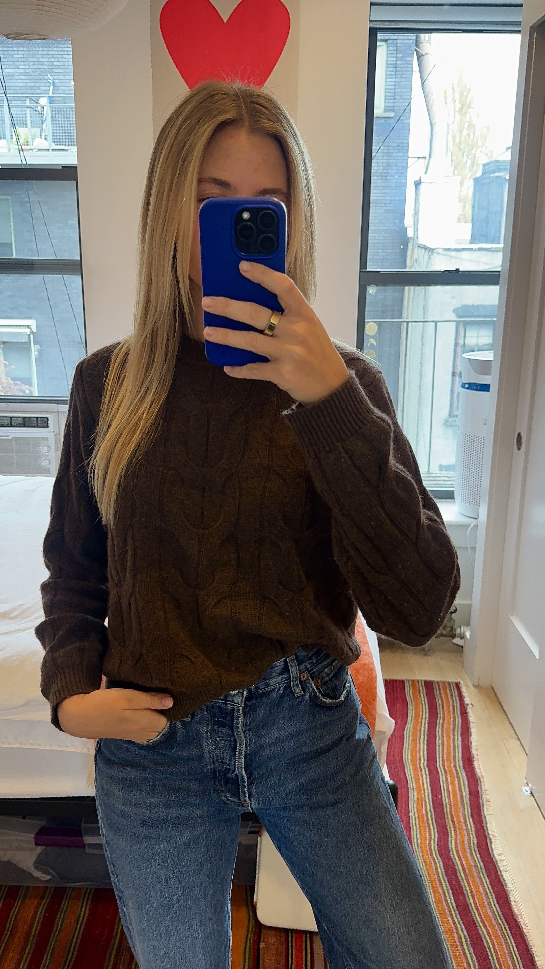 Bailey Burke in a cashmere sweater.