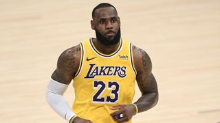 LeBron James #23 of the Los Angeles Lakers reacts after his three pointer in double overtime to lead the Lakers to a 135-129 win over the Detroit Pistons ahead of the 2024 NBA Play-in Tournament