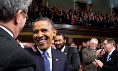 Voters and even some Republicans are warming up to the president; here Obama shares a laugh with Sen. Tom Coburn (R-Okla.). 