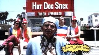 The band that dog. sitting on a bench in front of Hot Dog Stick in music video for Old Timer on Beavis and Butt-Head