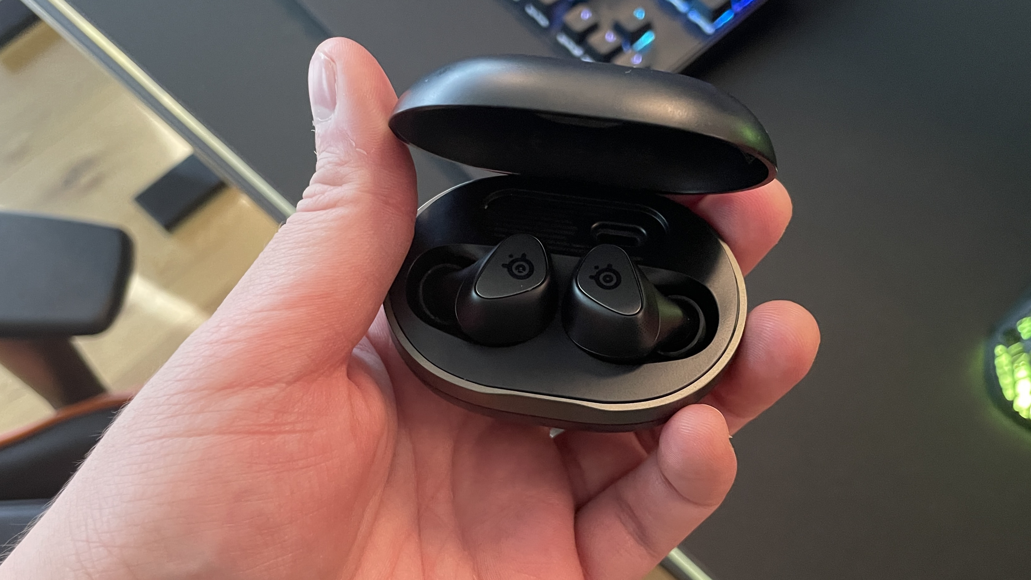 SteelSeries Arctis GameBuds in hand