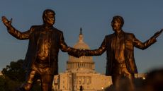 A statue depicting U.S. President Donald Trump and Jeffrey Epstein holding hands is seen near the U.S. Capitol in Washington, D.C., on October 4, 2025. (Photo by Mehmet Eser / Middle East Images via AFP) (Photo by MEHMET ESER/Middle East Images/AFP via Getty Images)