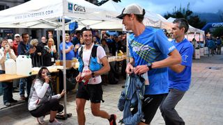 Kilian Jornet and Jim Walmsley chat at the 2017 UTMB