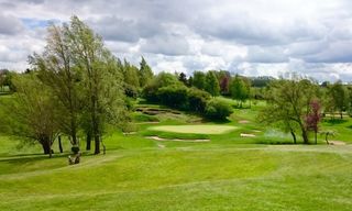 The downhill par-3 4th at Buckingham demands an accurate mid-iron