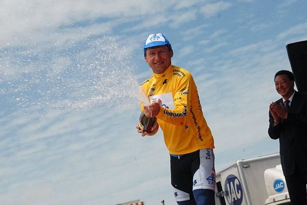 Petrochemical Tabriz Cycling Team rider Andrew Mizurov has a spray.