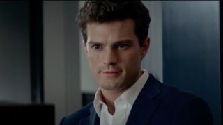 Jamie Dornan&#039;s Christian Grey being interviewed by Anastasia Steele in Fifty Shades of Grey