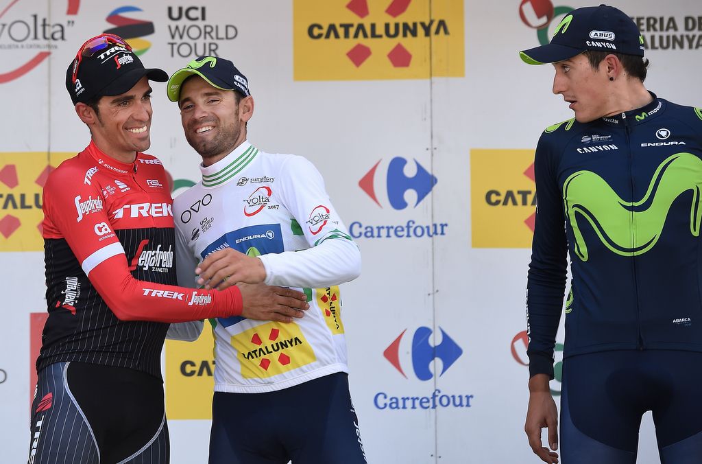 Alberto Contador (Trek-Segafredo) and Alejandro Valverde (Movistar) embrace and joke on the podium
