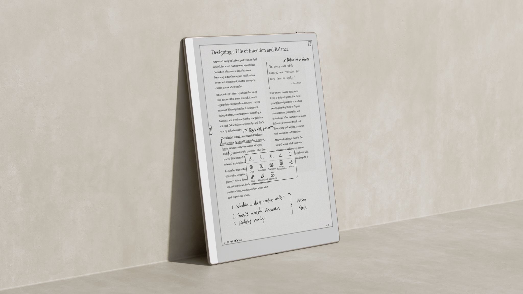 The Boox Go 10.3 (Gen 2) tablet set against a wall, displaying a user's work document/notes.