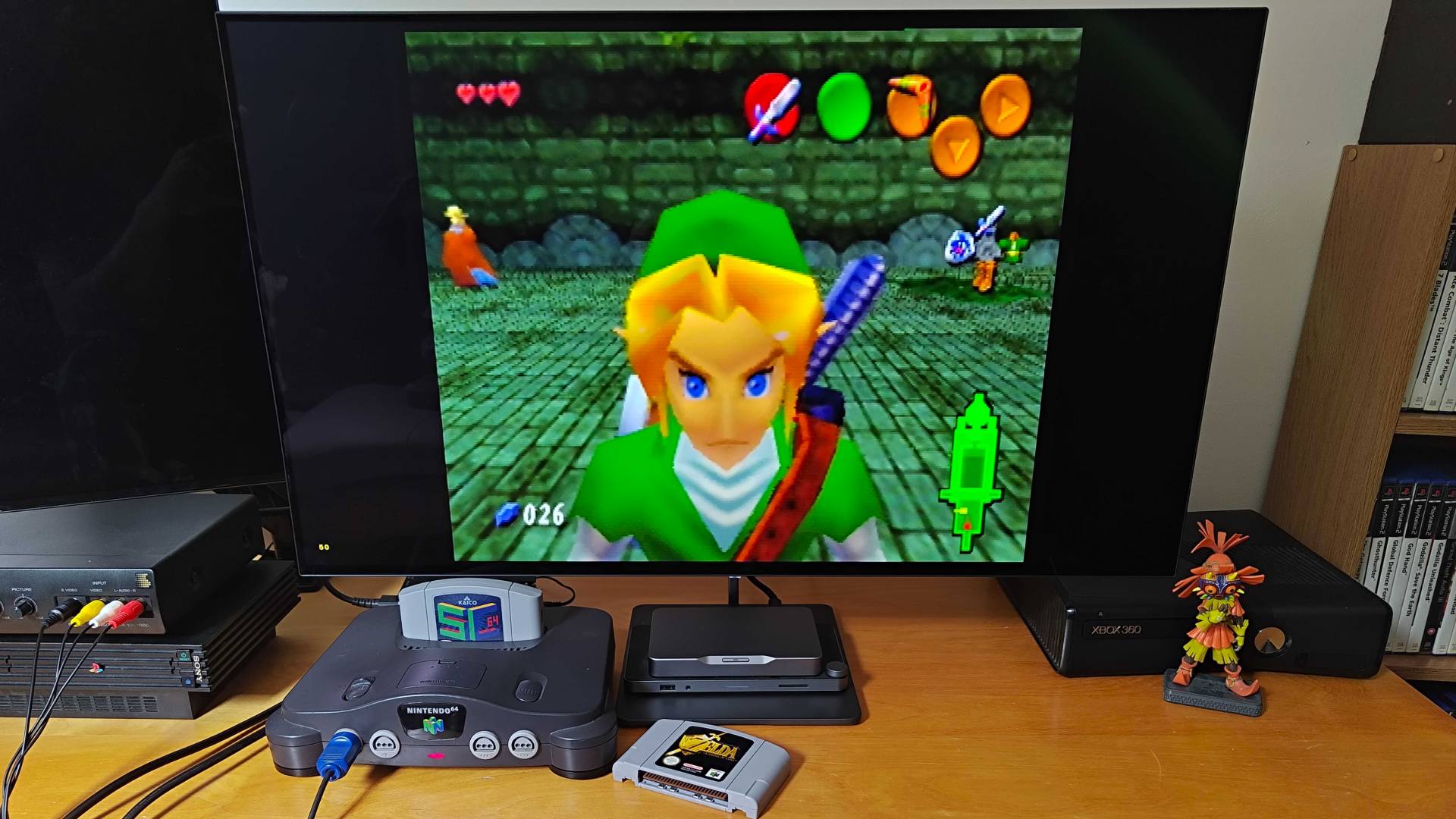 Nintendo 64 connected to Dough Spectrum Black 32 monitor with SummerCart 64 inserted and Ultimate Trail gameplay on screen.