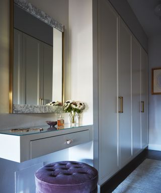 grey bedroom closet and vanity desk by Joshua Smith