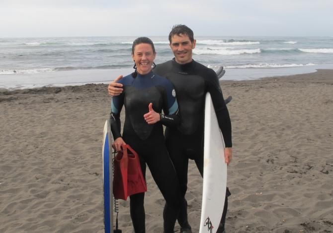 Mary McConneloug and Mike Broderick share some waves in Punta de Lobos, Chile