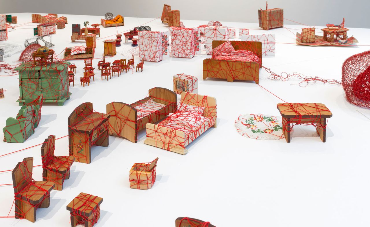 Installation view of Chiharu Shiota, &#039;Living Inside&#039; at Galerie Templon, Brussels, a doll&#039;s house like installation of sculpture. Photography: Isabelle Arthuis