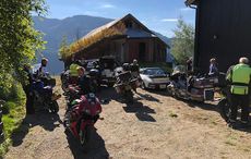 Bikers-arriving-late-at-overnight-cottage-but-theres-daylight-at-night.jpg