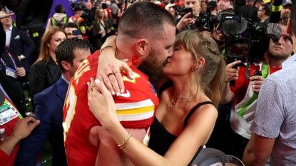 Travis Kelce #87 of the Kansas City Chiefs and Taylor Swift embrace after defeating the San Francisco 49ers in overtime during Super Bowl LVIII at Allegiant Stadium on February 11, 2024 in Las Vegas, Nevada. 