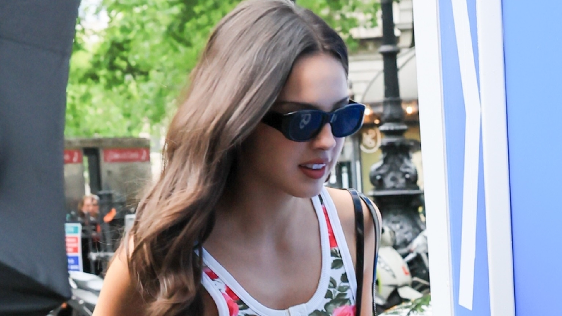 Olivia Rodrigo traded a white tank top for a floral alternative, black jeans, and pointy pumps