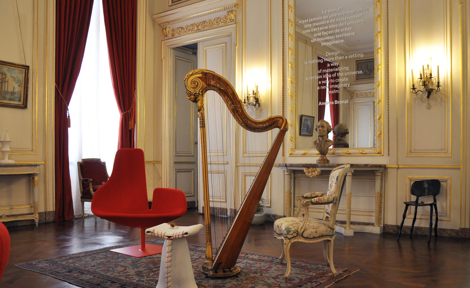 Exhibition hall with red chair and floor rug