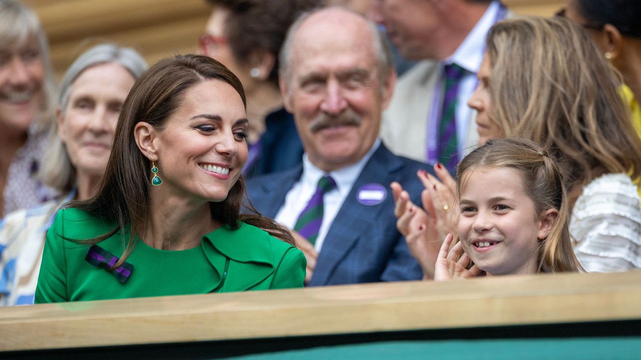 The Princess of Wales and Princess Charlotte smile in the royal box at Wimbledon