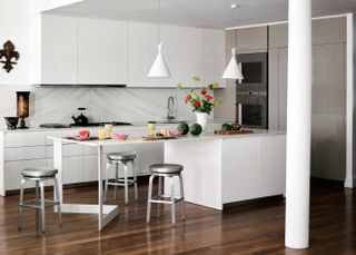 modern white kitchen in open plan living space