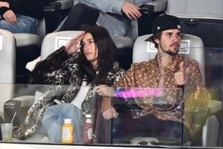 Justin Bieber and his wife US model Hailey Bieber watch Super Bowl LVIII between the Kansas City Chiefs and the San Francisco 49ers at Allegiant Stadium in Las Vegas, Nevada, February 11, 2024.