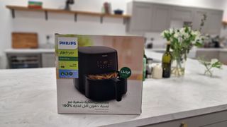 The Philips Essential Air Fryer XL in the box