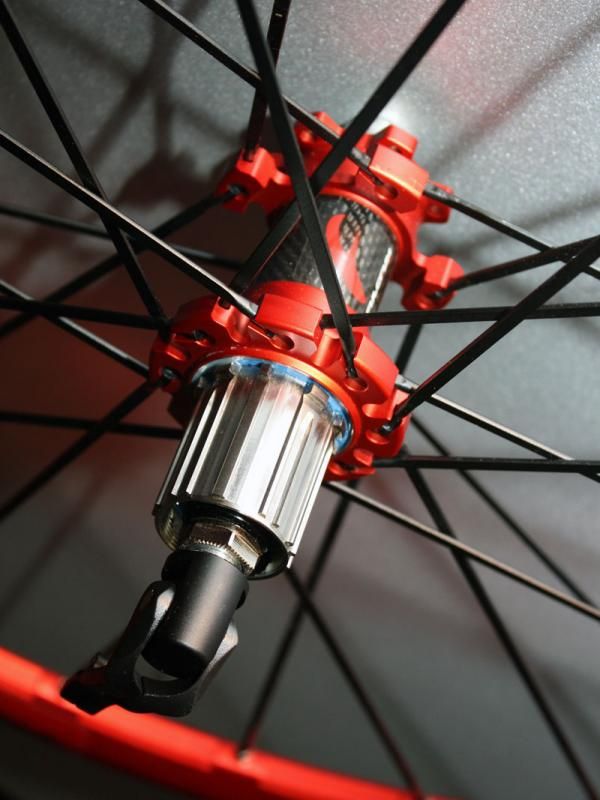 The 2011 Fulcrum Red Metal Zero rear hub gets a carbon center section and a titanium freehub body.