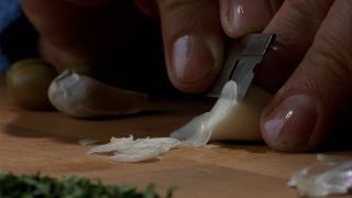 Slicing garlic with a razor in Goodfellas