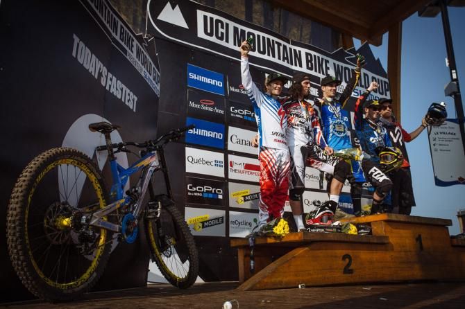 Sam Hill on the podium at the Mont-Sainte-Anne World Cup
