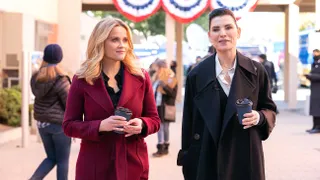 reese witherspoon and julianna margulies walk together in the morning show