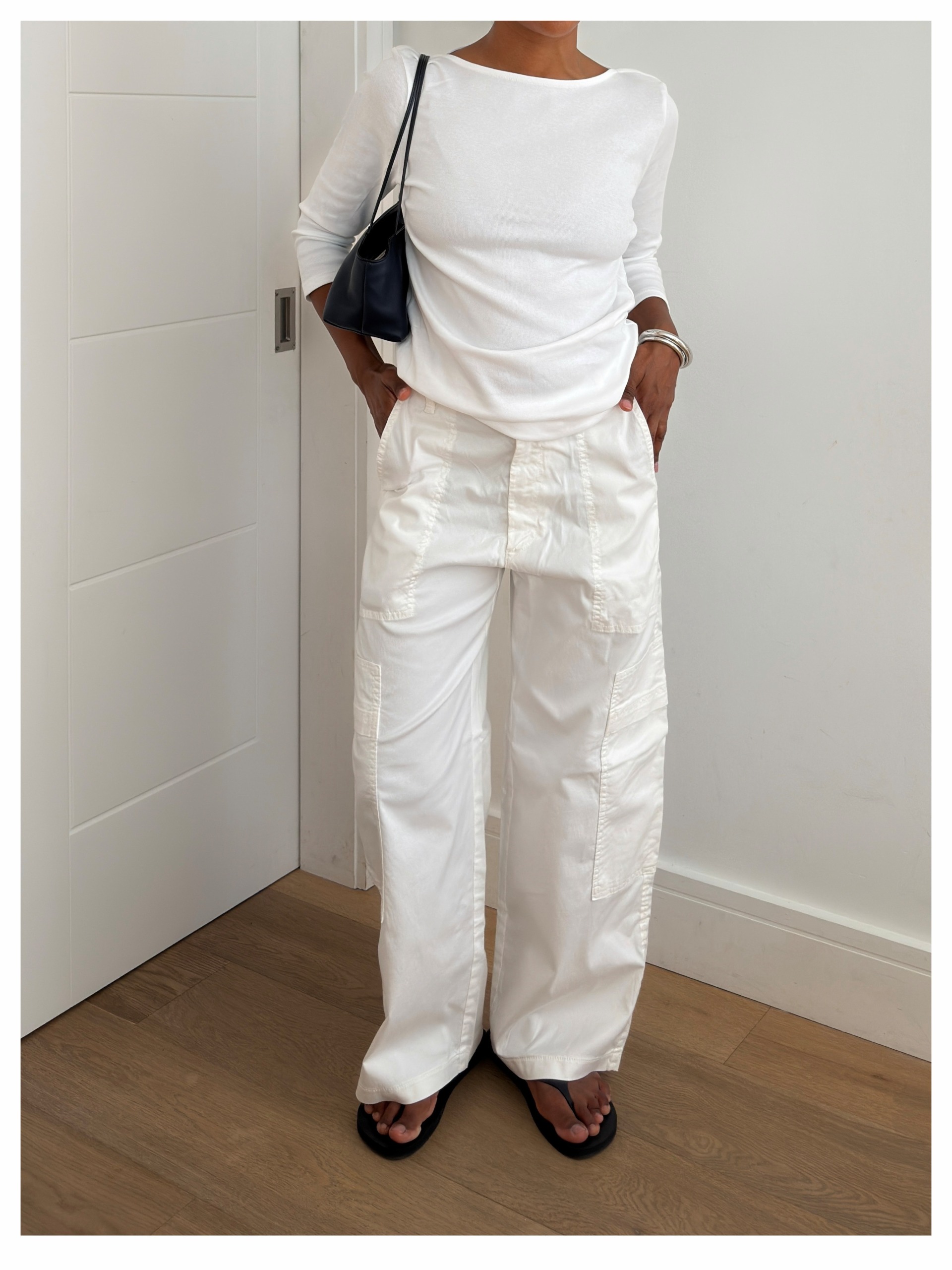 Woman in boat neck top and pants