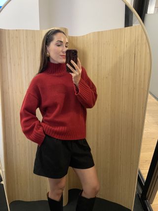 Anna LaPlaca wearing a COS cashmere sweater.