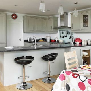 kitchen with kitchen worktop and wooden flooring